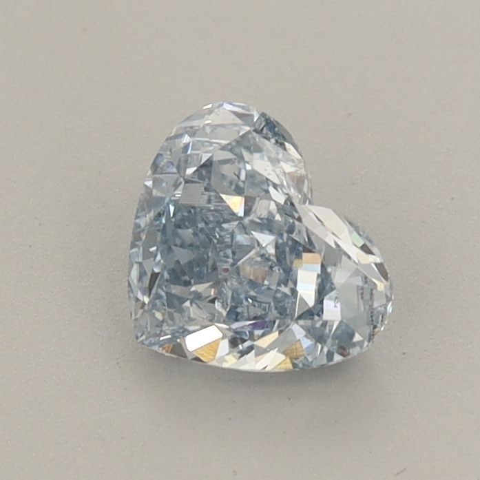 Loose Diamond - HEART 0.68ct Fancy Blue VS2: Loose Diamond - HEART 0.68ct Fancy Blue VS2 Source: This is a real non-mined Diamond that has been grown in a lab Shape: HEART Carats: 0.68 Color: Fancy Blue Certification: IGI Video:
