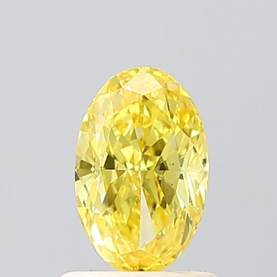 Loose Diamond - OVAL 1.02ct Fancy Vivid Yellow VVS2: Loose Diamond - OVAL 1.02ct Fancy Vivid Yellow VVS2 Source: This is a real non-mined Diamond that has been grown in a lab Shape: OVAL Carats: 1.02 Color: Fancy Vivid Yellow Certification: IGI Video: