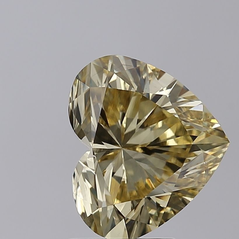 Loose Diamond - HEART 3.21ct Fancy Yellow VS1: Loose Diamond - HEART 3.21ct Fancy Yellow VS1 Source: This is a real non-mined Diamond that has been grown in a lab Shape: HEART Carats: 3.21 Color: Fancy Yellow Certification: IGI Video:
