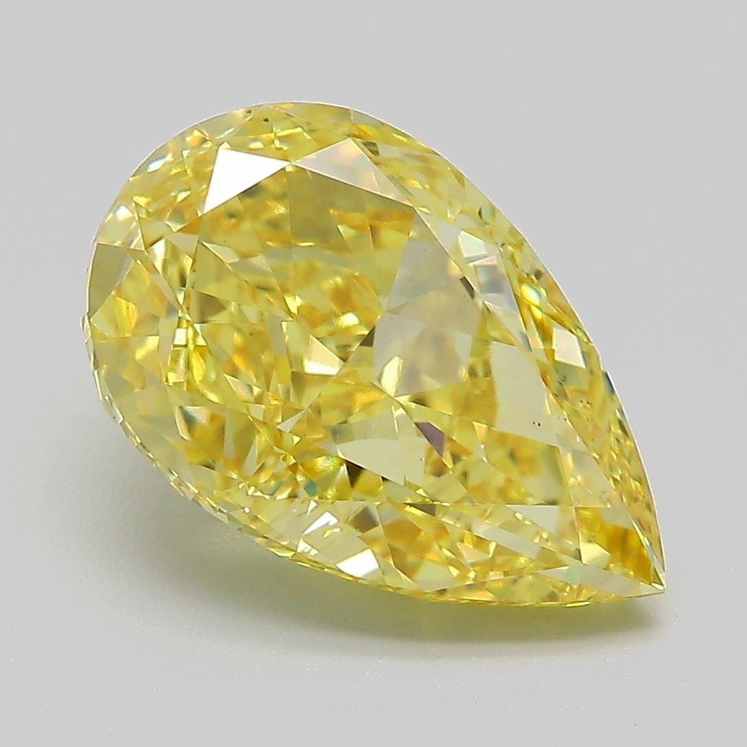 Loose Diamond - PEAR 5.17ct Fancy Vivid Yellow VS1: Loose Diamond - PEAR 5.17ct Fancy Vivid Yellow VS1 Source: This is a real non-mined Diamond that has been grown in a lab Shape: PEAR Carats: 5.17 Color: Fancy Vivid Yellow Certification: IGI Video: