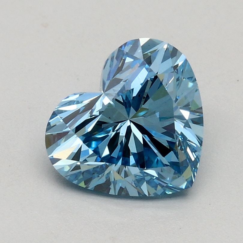 Loose Diamond - HEART 1.01ct Fancy Vivid Blue VS1: Loose Diamond - HEART 1.01ct Fancy Vivid Blue VS1 Source: This is a real non-mined Diamond that has been grown in a lab Shape: HEART Carats: 1.01 Color: Fancy Vivid Blue Certification: IGI Video: