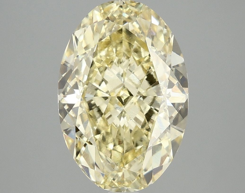 Loose Diamond - OVAL 4.1ct Fancy Vivid Yellow VS1: Loose Diamond - OVAL 4.1ct Fancy Vivid Yellow VS1 Source: This is a real non-mined Diamond that has been grown in a lab Shape: OVAL Carats: 4.1 Color: Fancy Vivid Yellow Certification: IGI Video: