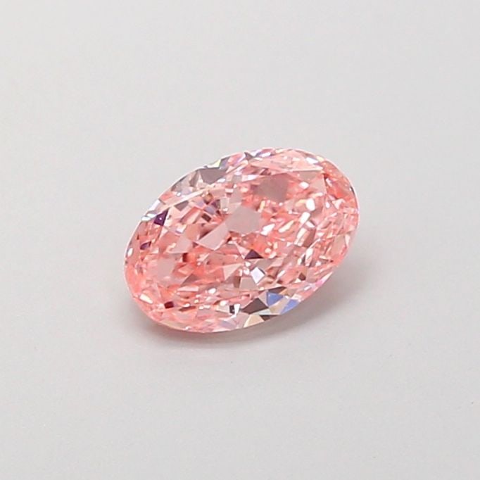Loose Diamond - OVAL 0.6ct Fancy Vivid Pink VS1: Loose Diamond - OVAL 0.6ct Fancy Vivid Pink VS1 Source: This is a real non-mined Diamond that has been grown in a lab Shape: OVAL Carats: 0.6 Color: Fancy Vivid Pink Certification: IGI Video: