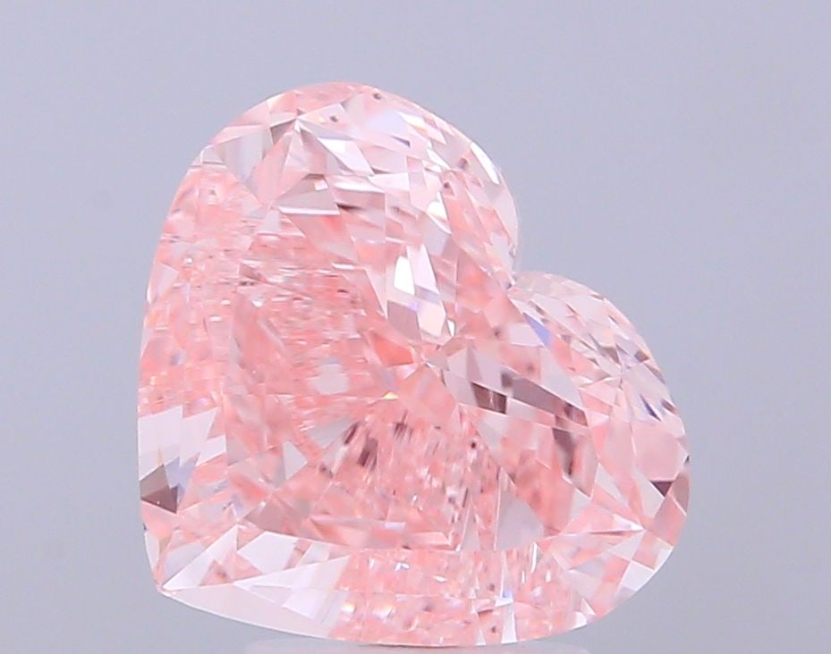 Loose Diamond - HEART 5.02ct Fancy Intense Pink VVS2: Loose Diamond - HEART 5.02ct Fancy Intense Pink VVS2 Source: This is a real non-mined Diamond that has been grown in a lab Shape: HEART Carats: 5.02 Color: Fancy Intense Pink Certification: IGI Video: