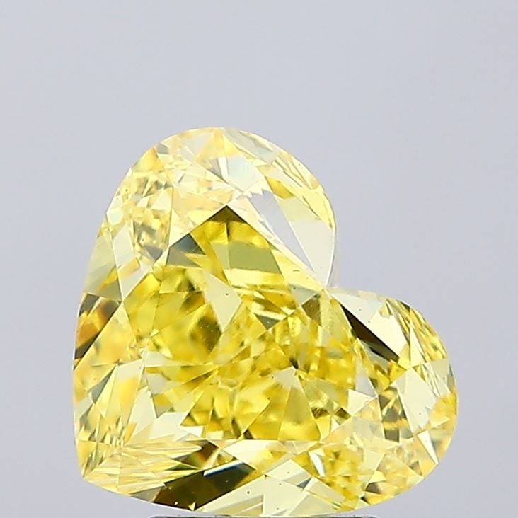 Loose Diamond - HEART 5.06ct Fancy Vivid Yellow VS1: Loose Diamond - HEART 5.06ct Fancy Vivid Yellow VS1 Source: This is a real non-mined Diamond that has been grown in a lab Shape: HEART Carats: 5.06 Color: Fancy Vivid Yellow Certification: IGI Video: