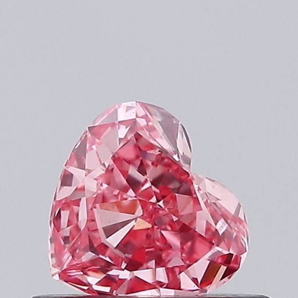 Loose Diamond - HEART 0.44ct Fancy Vivid Pink VVS2: Loose Diamond - HEART 0.44ct Fancy Vivid Pink VVS2 Source: This is a real non-mined Diamond that has been grown in a lab Shape: HEART Carats: 0.44 Color: Fancy Vivid Pink Certification: IGI Video: