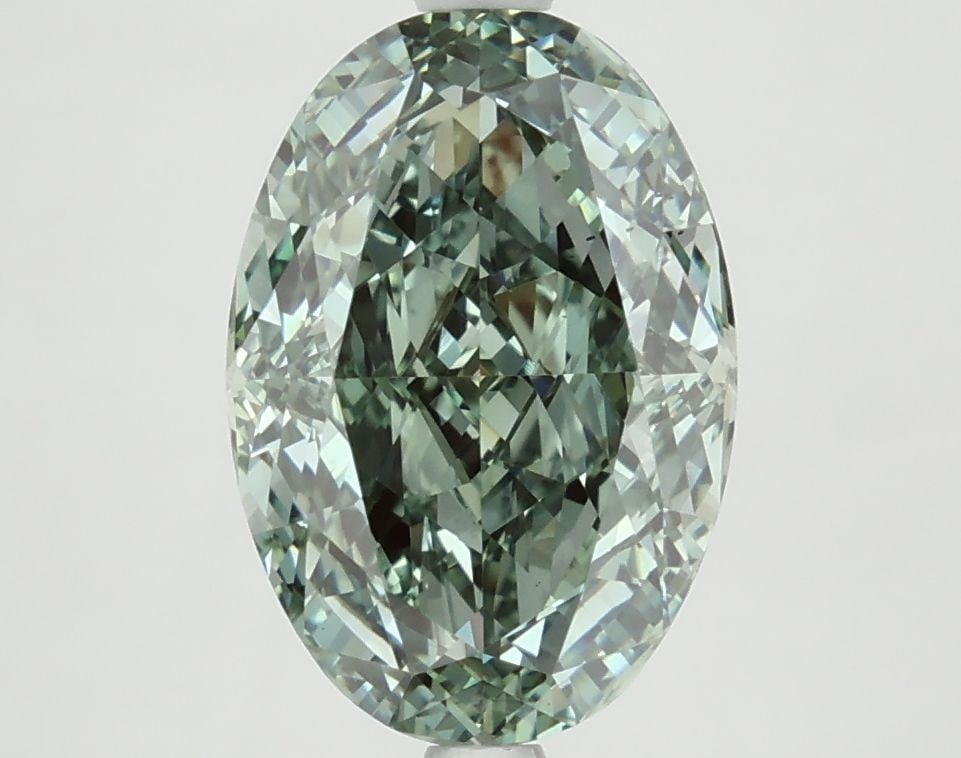 Loose Diamond - OVAL 3.65ct Fancy Vivid Green VS2: Loose Diamond - OVAL 3.65ct Fancy Vivid Green VS2 Source: This is a real non-mined Diamond that has been grown in a lab Shape: OVAL Carats: 3.65 Color: Fancy Vivid Green Certification: NONE The Diamon