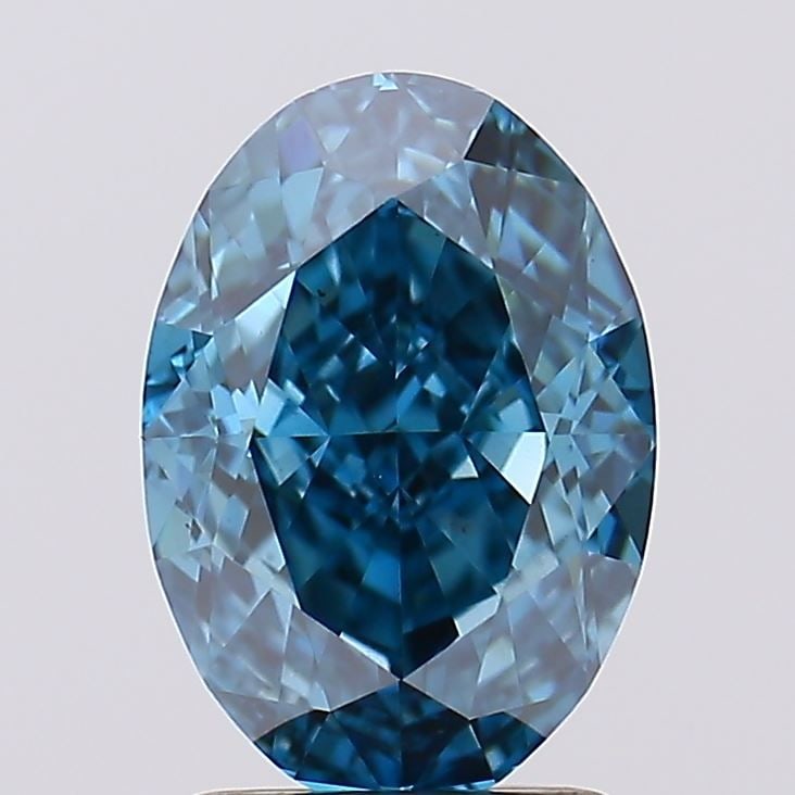 Loose Diamond - OVAL 2.44ct Fancy Vivid Blue VS2: Loose Diamond - OVAL 2.44ct Fancy Vivid Blue VS2 Source: This is a real non-mined Diamond that has been grown in a lab Shape: OVAL Carats: 2.44 Color: Fancy Vivid Blue Certification: IGI Video: