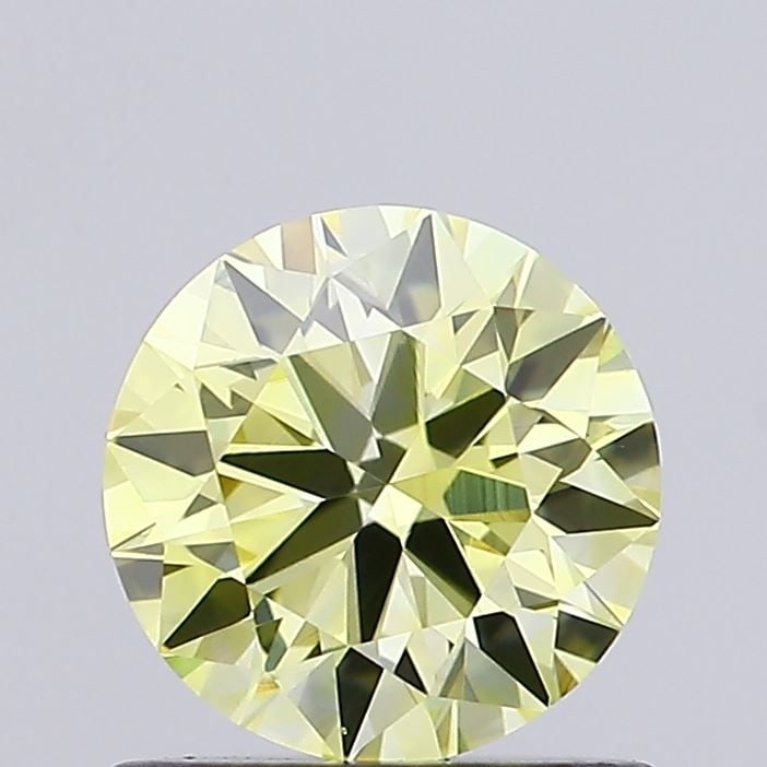 Ideal Loose Diamond - ROUND 0.83ct Fancy Yellow VVS2: Ideal Loose Diamond - ROUND 0.83ct Fancy Yellow VVS2 Source: This is a real non-mined Diamond that has been grown in a lab Shape: ROUND Carats: 0.83 Color: Fancy Yellow Certification: IGI The Diamond 