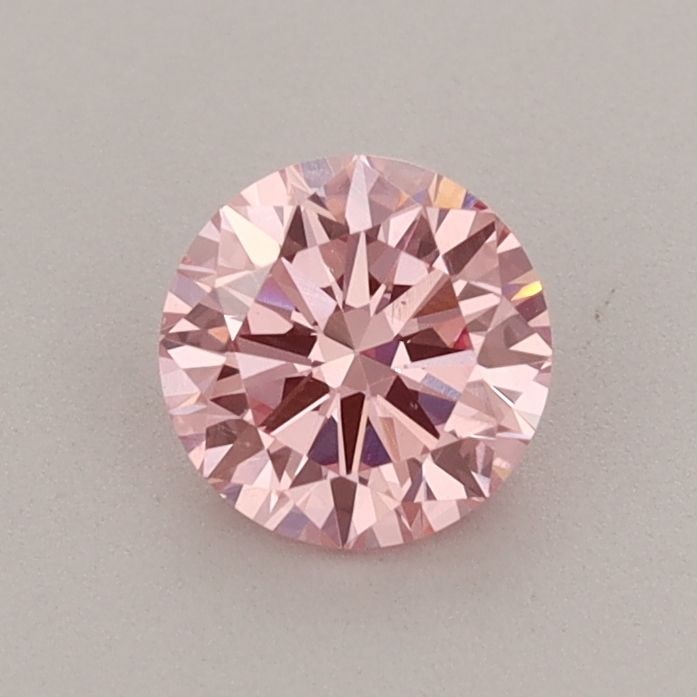 Loose Diamond - ROUND 0.62ct Fancy Vivid Pink VS1: Loose Diamond - ROUND 0.62ct Fancy Vivid Pink VS1 Source: This is a real non-mined Diamond that has been grown in a lab Shape: ROUND Carats: 0.62 Color: Fancy Vivid Pink Certification: IGI Video: