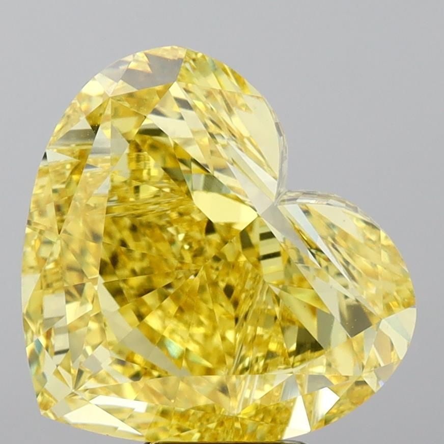 Loose Diamond - HEART 11.21ct Fancy Vivid Yellow VS1: Loose Diamond - HEART 11.21ct Fancy Vivid Yellow VS1 Source: This is a real non-mined Diamond that has been grown in a lab Shape: HEART Carats: 11.21 Color: Fancy Vivid Yellow Certification: IGI Video