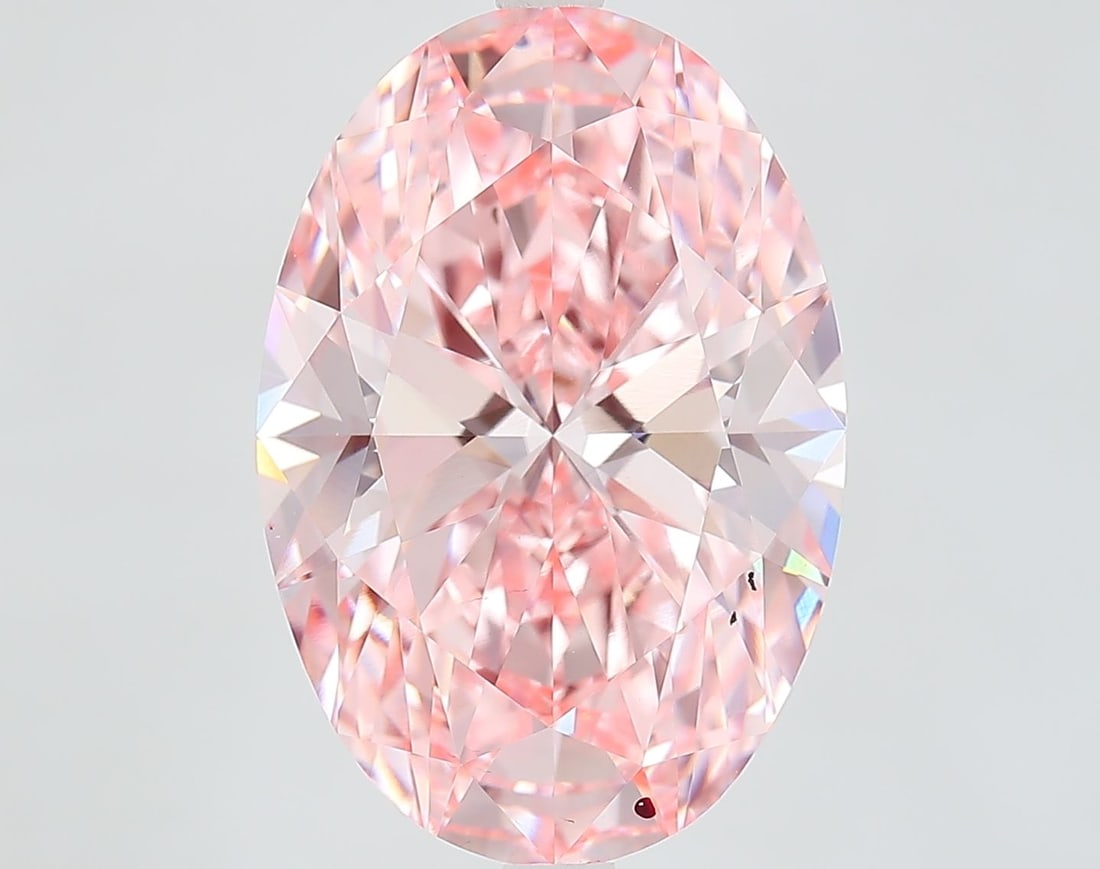 Loose Diamond - OVAL 8.81ct Fancy Vivid Pink VS1: Loose Diamond - OVAL 8.81ct Fancy Vivid Pink VS1 Source: This is a real non-mined Diamond that has been grown in a lab Shape: OVAL Carats: 8.81 Color: Fancy Vivid Pink Certification: IGI Video: