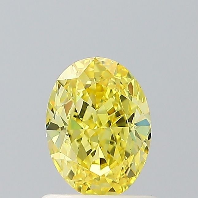 Loose Diamond - OVAL 1.01ct Fancy Vivid Yellow VS1: Loose Diamond - OVAL 1.01ct Fancy Vivid Yellow VS1 Source: This is a real non-mined Diamond that has been grown in a lab Shape: OVAL Carats: 1.01 Color: Fancy Vivid Yellow Certification: IGI Video: