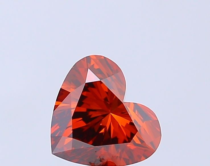 Loose Diamond - HEART 1.27ct Fancy Vivid Brownish Orange VS1: Loose Diamond - HEART 1.27ct Fancy Vivid Brownish Orange VS1 Source: This is a real non-mined Diamond that has been grown in a lab Shape: HEART Carats: 1.27 Color: Fancy Vivid Brownish Orange Certific
