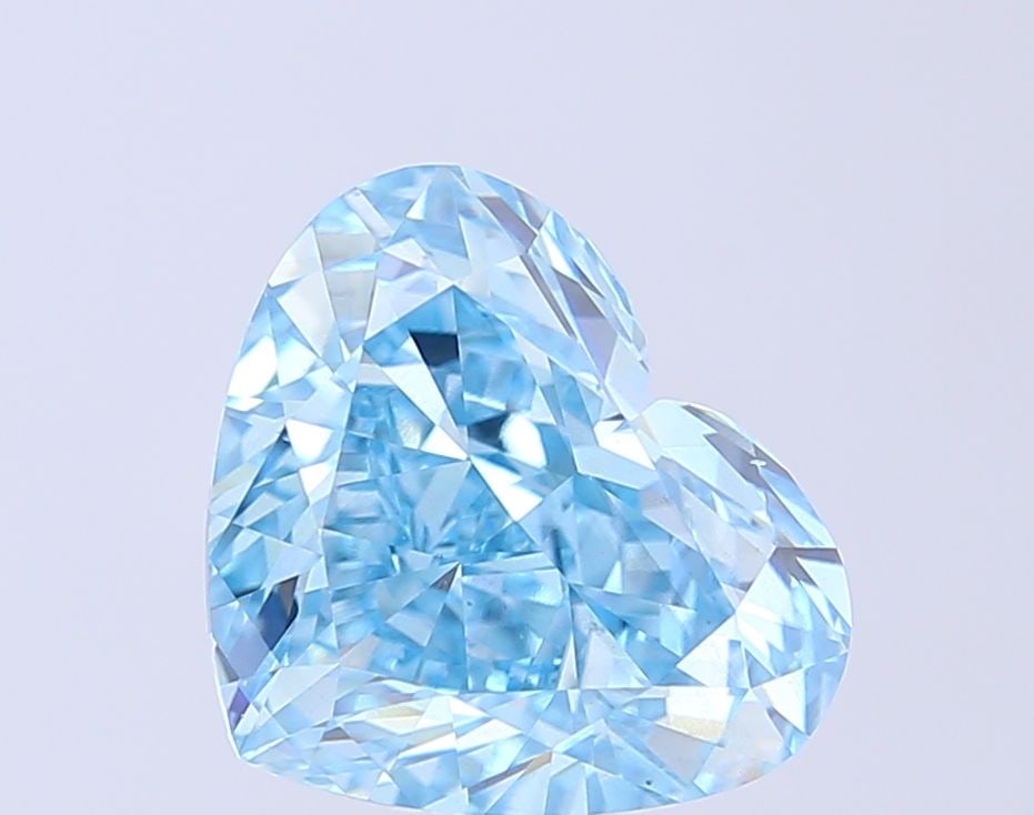 Loose Diamond - HEART 5.03ct Fancy Vivid Blue VS2: Loose Diamond - HEART 5.03ct Fancy Vivid Blue VS2 Source: This is a real non-mined Diamond that has been grown in a lab Shape: HEART Carats: 5.03 Color: Fancy Vivid Blue Certification: IGI Video: