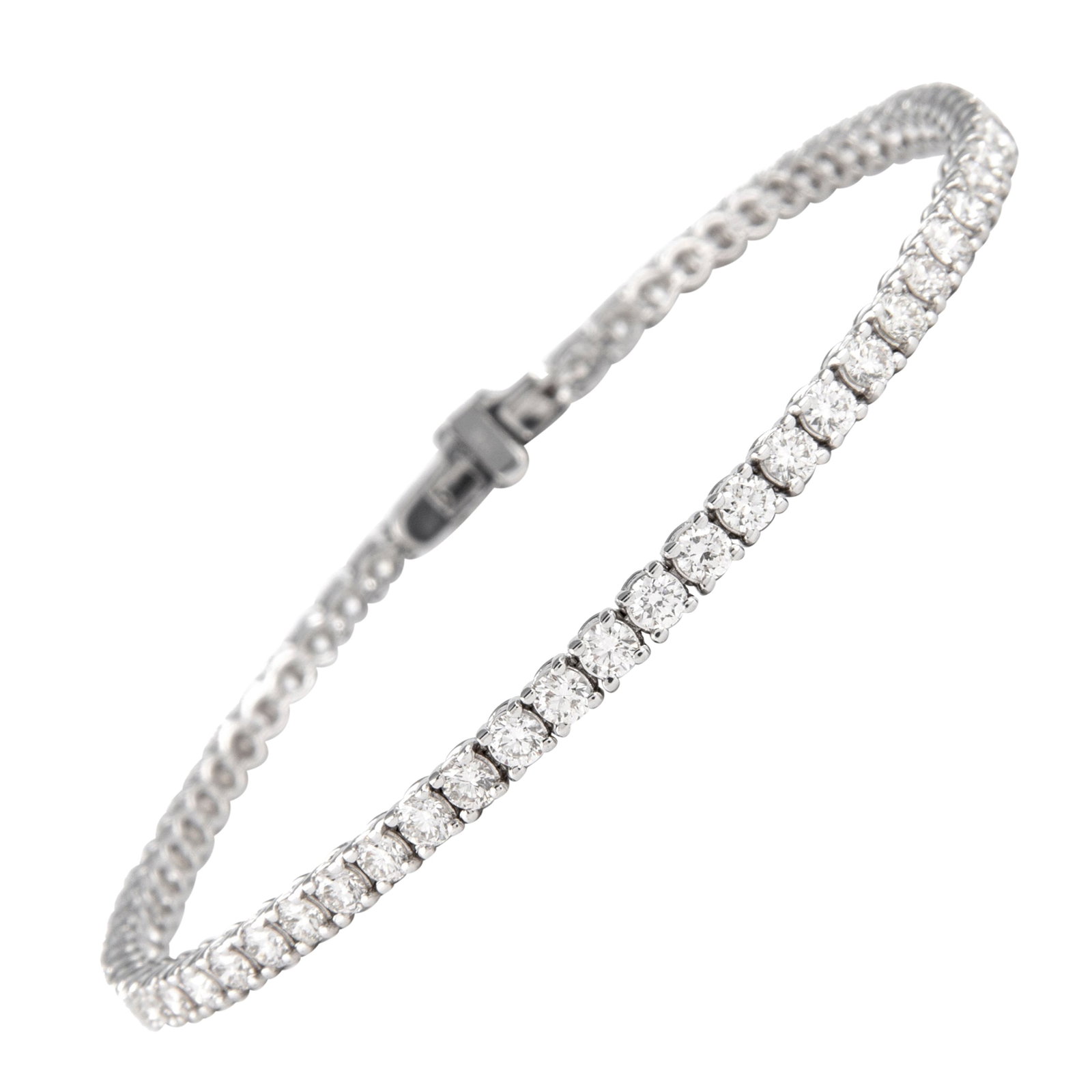 14k White Gold 3.56ct Diamond Tennis Bracelet: 14k White Gold 3.56ct Diamond Tennis Bracelet Exquisite and timeless diamond tennis bracelet set with 66 round brilliant white diamonds totaling 3.56 ct. The diamonds are approximately F/G color and V