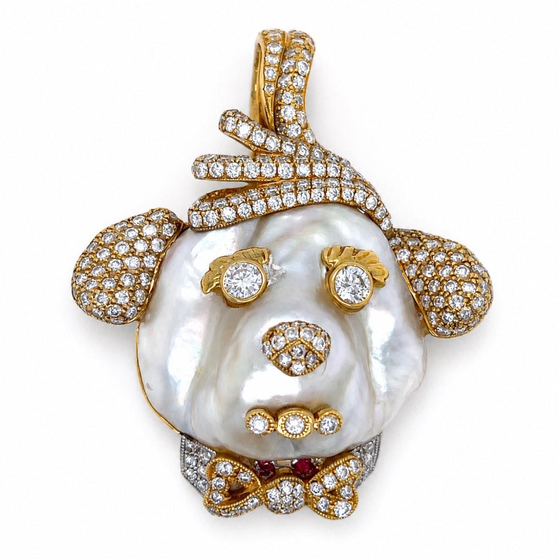 South Sea Pearl Diamond Pendant in 18K Yellow Gold 1.75 Inches: South Sea Pearl Diamond Pendant in 18K Yellow Gold 1.75 Inches Pre-owned pendant crafted in 18K yellow gold, featuring a South Sea pearl accented by diamonds. The piece has unknown hallmarks. Specific