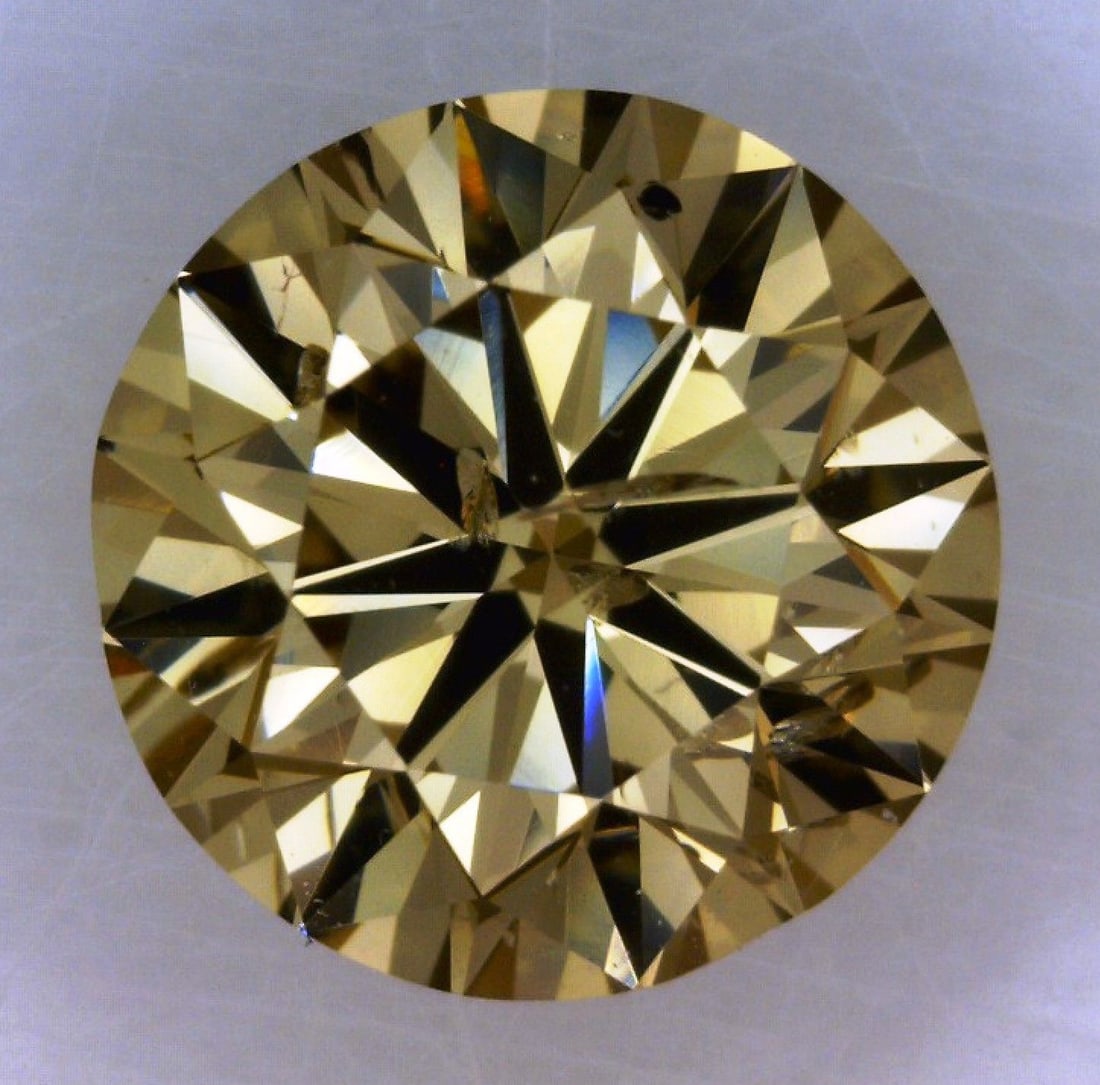 Loose Diamond - ROUND 0.83ct Fancy Dark Yellow Yellow Brown: Loose Diamond - ROUND 0.83ct Fancy Dark Yellow Yellow Brown Source: Natural Shape: ROUND Carats: 0.83 Color: Fancy Dark Yellow Yellow Brown Certification: GIA The Diamond Depot Guarantee: All items in