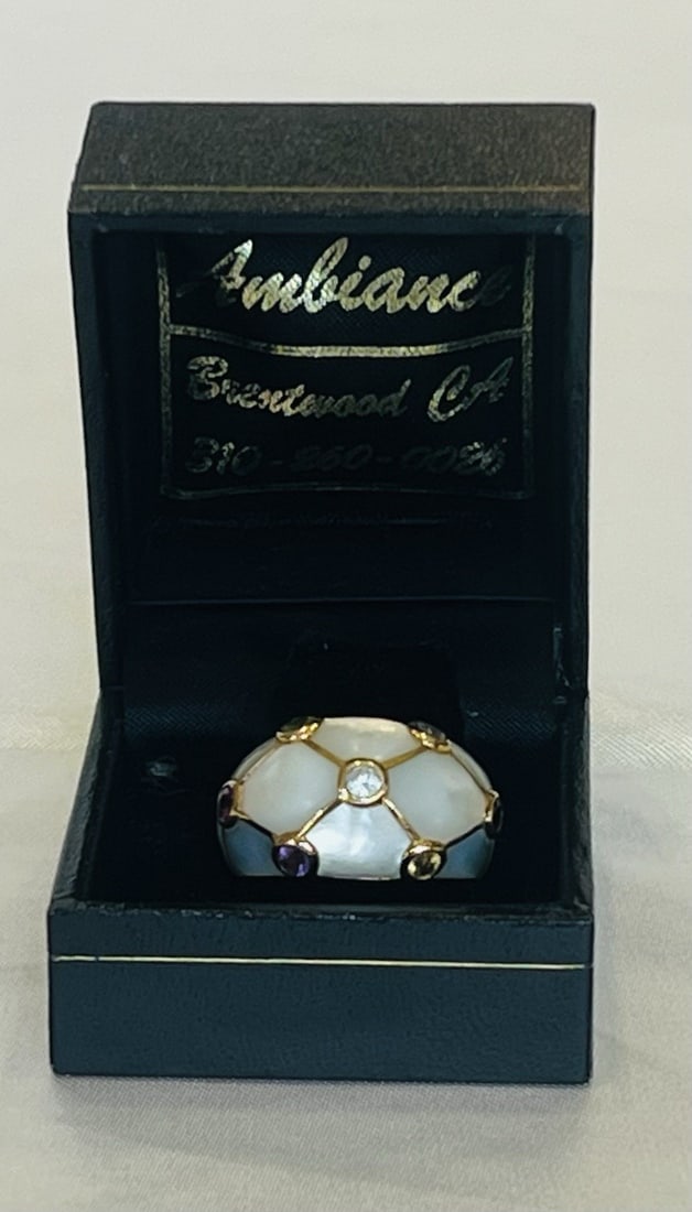 Unbranded 14k Yellow Gold Ring Size 8 with Garnet Mother of Pearl: Unbranded 14k Yellow Gold Ring Size 8 with Garnet Mother of Pearl Pre-owned unbranded 14k yellow gold ring featuring garnet, topaz, and mother of pearl. This size 8 ring has detailed design and workma