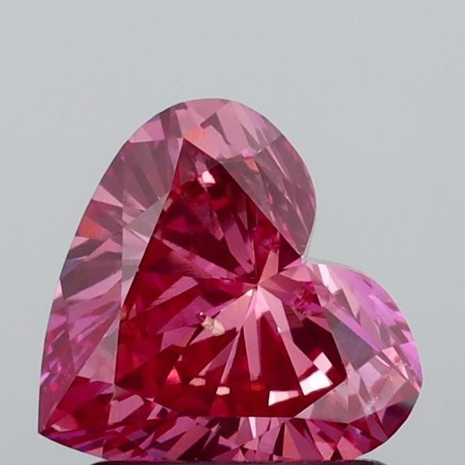 Loose Diamond - HEART 1.18ct Fancy Vivid Pink SI1: Loose Diamond - HEART 1.18ct Fancy Vivid Pink SI1 Source: This is a real non-mined Diamond that has been grown in a lab Shape: HEART Carats: 1.18 Color: Fancy Vivid Pink Certification: IGI Video:
