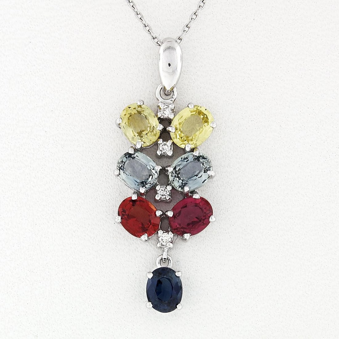 14K White Gold Sapphire Diamond Dangle Pendant Necklace 3.54ctw: 14K White Gold Sapphire Diamond Dangle Pendant Necklace 3.54ctw Pre-owned women's dangle pendant necklace crafted in solid 14k white gold, featuring natural genuine multi-color sapphires and a diamond