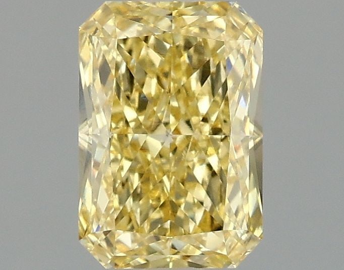 Loose Diamond - RADIANT 1.55ct Fancy Vivid Yellow VS1: Loose Diamond - RADIANT 1.55ct Fancy Vivid Yellow VS1 Source: This is a real non-mined Diamond that has been grown in a lab Shape: RADIANT Carats: 1.55 Color: Fancy Vivid Yellow Certification: IGI Vid