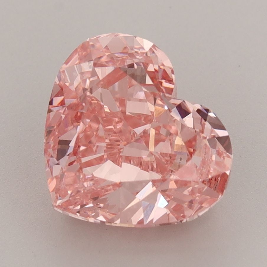 Loose Diamond - HEART 3.56ct Fancy Vivid Pink VVS2: Loose Diamond - HEART 3.56ct Fancy Vivid Pink VVS2 Source: This is a real non-mined Diamond that has been grown in a lab Shape: HEART Carats: 3.56 Color: Fancy Vivid Pink Certification: IGI Video: