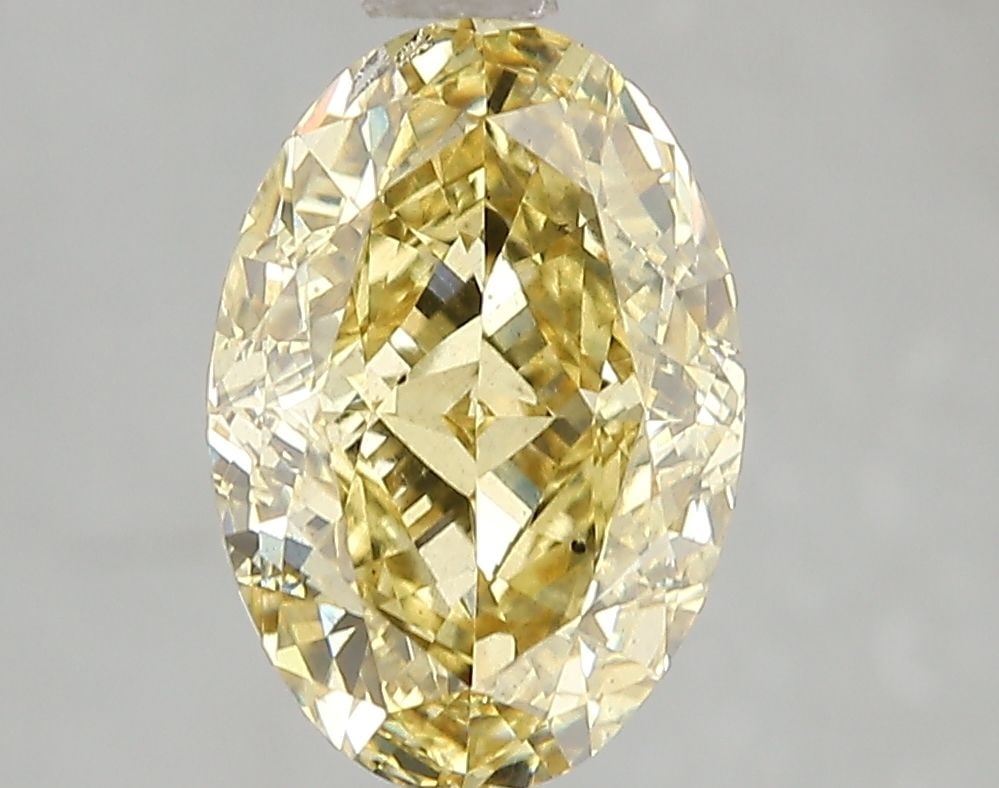 Loose Diamond - OVAL 3.0ct Fancy Intense Yellow SI1: Loose Diamond - OVAL 3.0ct Fancy Intense Yellow SI1 Source: This is a real non-mined Diamond that has been grown in a lab Shape: OVAL Carats: 3.0 Color: Fancy Intense Yellow Certification: IGI Video: