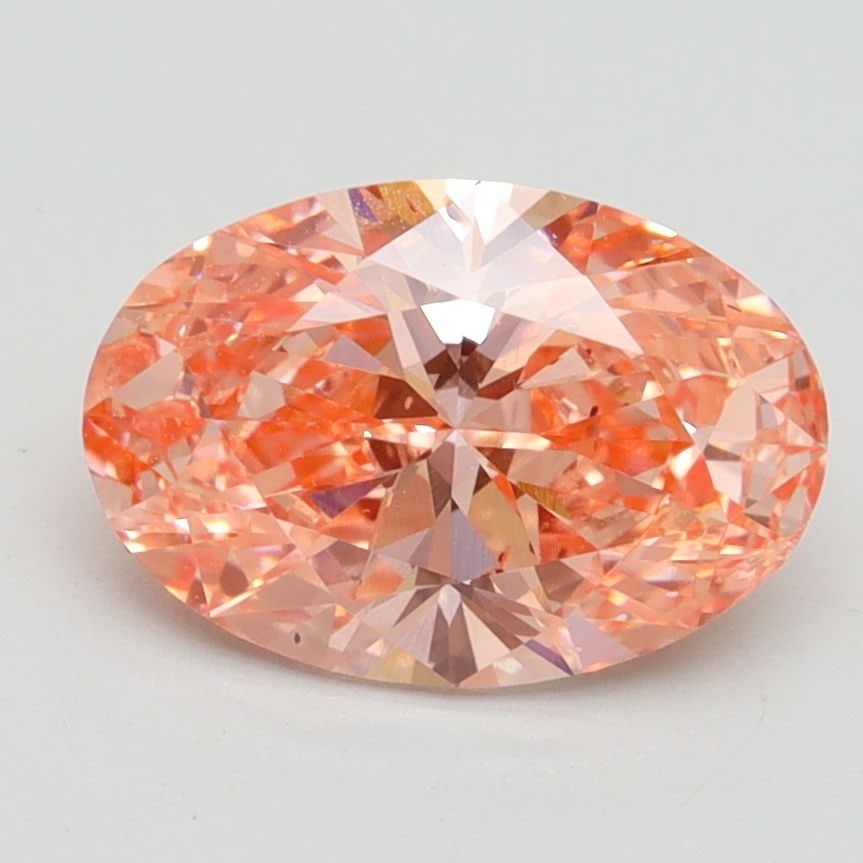 Loose Diamond - OVAL 1.76ct Fancy Vivid Pink SI2: Loose Diamond - OVAL 1.76ct Fancy Vivid Pink SI2 Source: This is a real non-mined Diamond that has been grown in a lab Shape: OVAL Carats: 1.76 Color: Fancy Vivid Pink Certification: IGI Video: