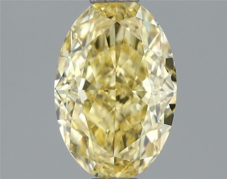Loose Diamond - OVAL 1.52ct Fancy Intense Yellow VS1: Loose Diamond - OVAL 1.52ct Fancy Intense Yellow VS1 Source: This is a real non-mined Diamond that has been grown in a lab Shape: OVAL Carats: 1.52 Color: Fancy Intense Yellow Certification: IGI The D