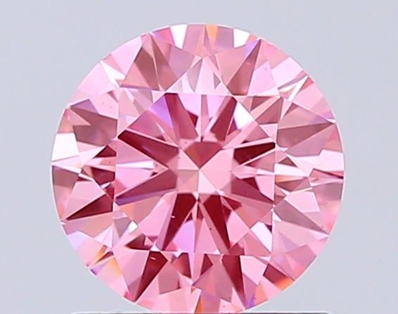 Ideal Loose Diamond - ROUND 1.06ct Fancy Vivid Pink VS2: Ideal Loose Diamond - ROUND 1.06ct Fancy Vivid Pink VS2 Source: This is a real non-mined Diamond that has been grown in a lab Shape: ROUND Carats: 1.06 Color: Fancy Vivid Pink Certification: IGI Video