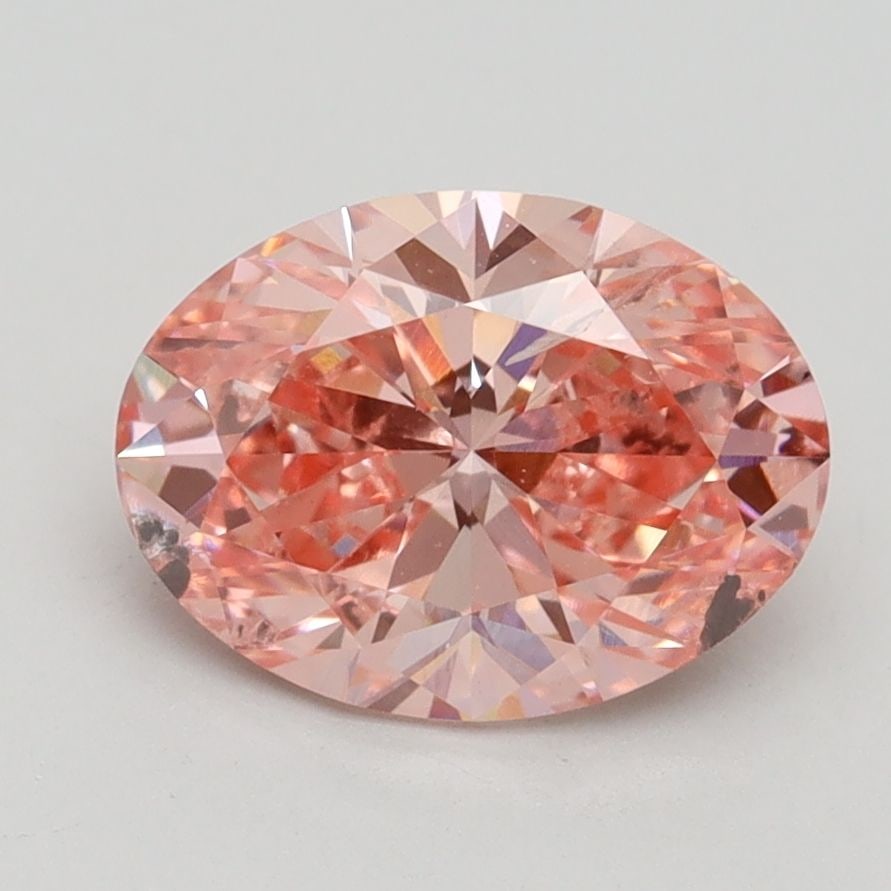 Loose Diamond - OVAL 2.03ct Fancy Vivid Pink SI2: Loose Diamond - OVAL 2.03ct Fancy Vivid Pink SI2 Source: This is a real non-mined Diamond that has been grown in a lab Shape: OVAL Carats: 2.03 Color: Fancy Vivid Pink Certification: IGI Video: