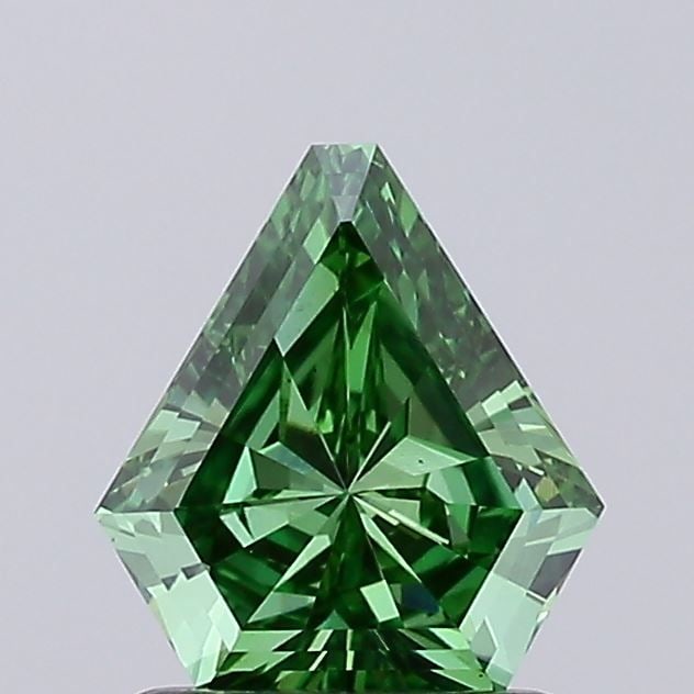Loose Diamond - SHIELD 1.04ct Fancy Vivid Green VS1: Loose Diamond - SHIELD 1.04ct Fancy Vivid Green VS1 Source: This is a real non-mined Diamond that has been grown in a lab Shape: SHIELD Carats: 1.04 Color: Fancy Vivid Green Certification: IGI Video: