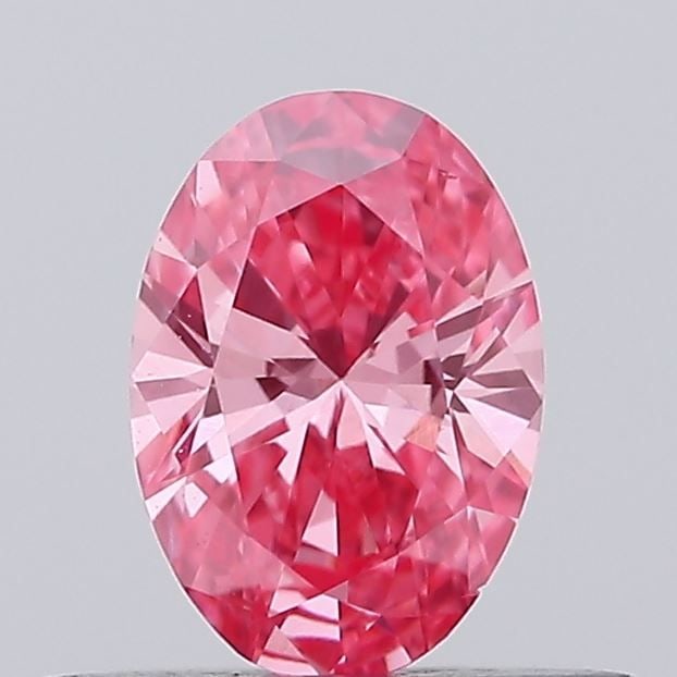 Loose Diamond - OVAL 0.28ct Fancy Vivid Pink VS1: Loose Diamond - OVAL 0.28ct Fancy Vivid Pink VS1 Source: This is a real non-mined Diamond that has been grown in a lab Shape: OVAL Carats: 0.28 Color: Fancy Vivid Pink Certification: IGI Video: