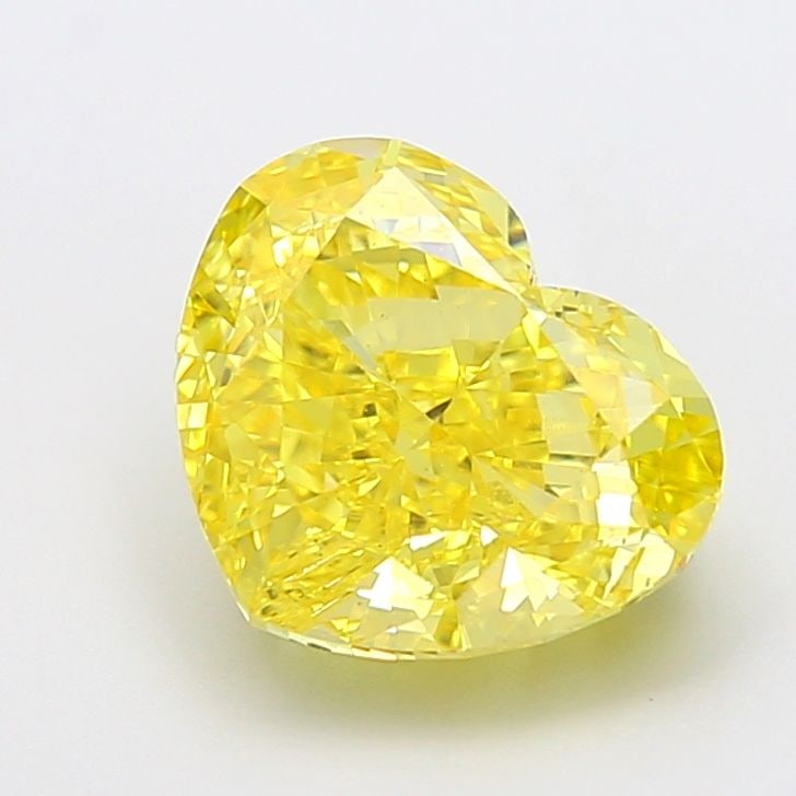 Loose Diamond - HEART 5.05ct Fancy Vivid Yellow VS1: Loose Diamond - HEART 5.05ct Fancy Vivid Yellow VS1 Source: This is a real non-mined Diamond that has been grown in a lab Shape: HEART Carats: 5.05 Color: Fancy Vivid Yellow Certification: IGI The Dia