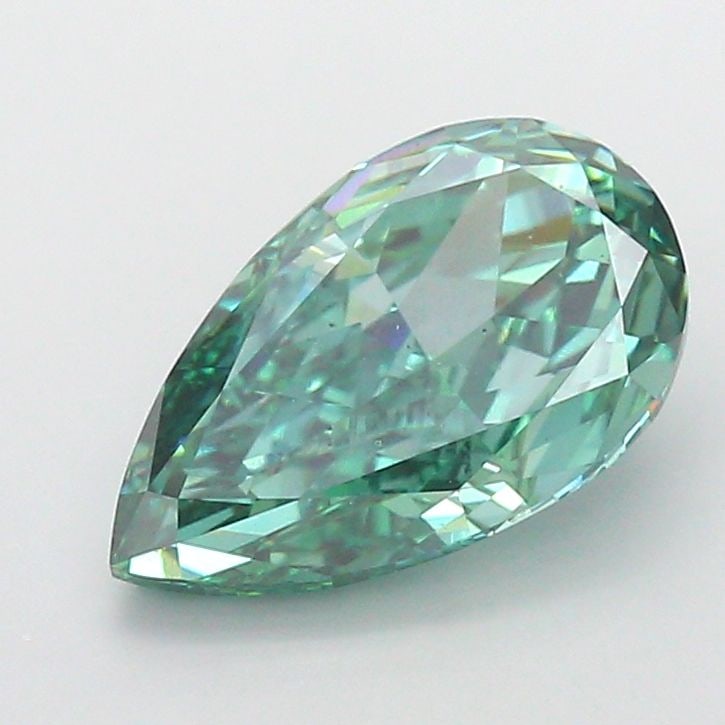 Loose Diamond - PEAR 5.01ct Fancy Vivid Green VS2: Loose Diamond - PEAR 5.01ct Fancy Vivid Green VS2 Source: This is a real non-mined Diamond that has been grown in a lab Shape: PEAR Carats: 5.01 Color: Fancy Vivid Green Certification: IGI Video: