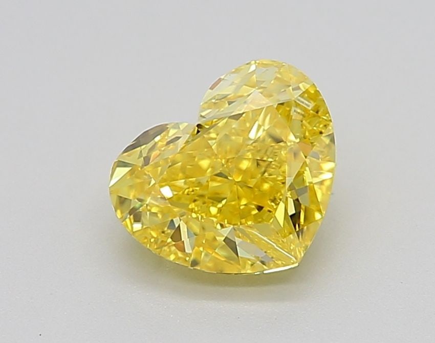 Loose Diamond - HEART 1.31ct Fancy Vivid Yellow VVS1: Loose Diamond - HEART 1.31ct Fancy Vivid Yellow VVS1 Source: This is a real non-mined Diamond that has been grown in a lab Shape: HEART Carats: 1.31 Color: Fancy Vivid Yellow Certification: IGI Video: