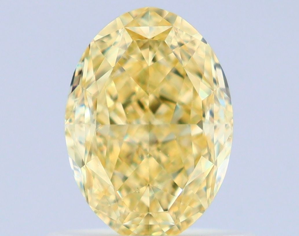 Loose Diamond - OVAL 0.82ct Fancy Yellow VVS2: Loose Diamond - OVAL 0.82ct Fancy Yellow VVS2 Source: Natural Shape: OVAL Carats: 0.82 Color: Fancy Yellow Certification: GIA Video: