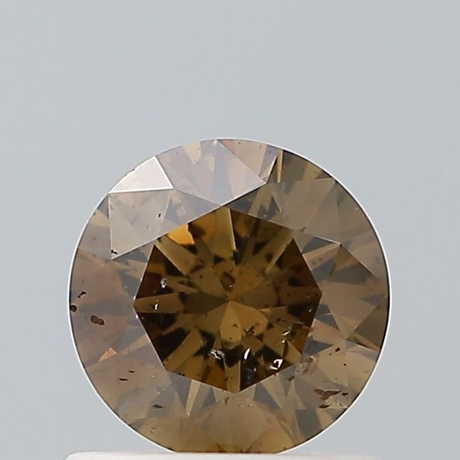 Loose Diamond - ROUND 0.72ct Fancy Green SI1: Loose Diamond - ROUND 0.72ct Fancy Green SI1 Source: Natural Shape: ROUND Carats: 0.72 Color: Fancy Green Certification: NONE Video: