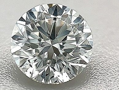 Loose Diamond - ROUND 0.6ct E SI1: Loose Diamond - ROUND 0.6ct E SI1 Source: Natural Shape: ROUND Carats: 0.6 Color: E Clarity: SI1 Certification: IGI The Diamond Depot Guarantee: All items in this auction are guaranteed to be 100% aut