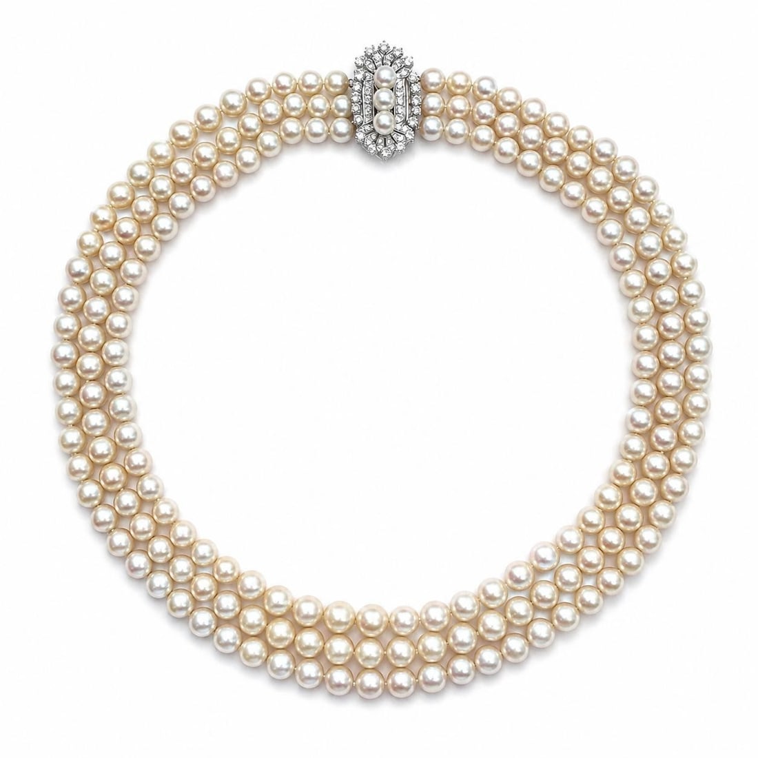 3 Strand Cultured Pearl Necklace 14k White Gold Diamond Clasp: 3 Strand Cultured Pearl Necklace 14k White Gold Diamond Clasp Vintage mid-century graduated cultured pearl necklace featuring three layered strands and a white gold clasp accented with diamonds. The n