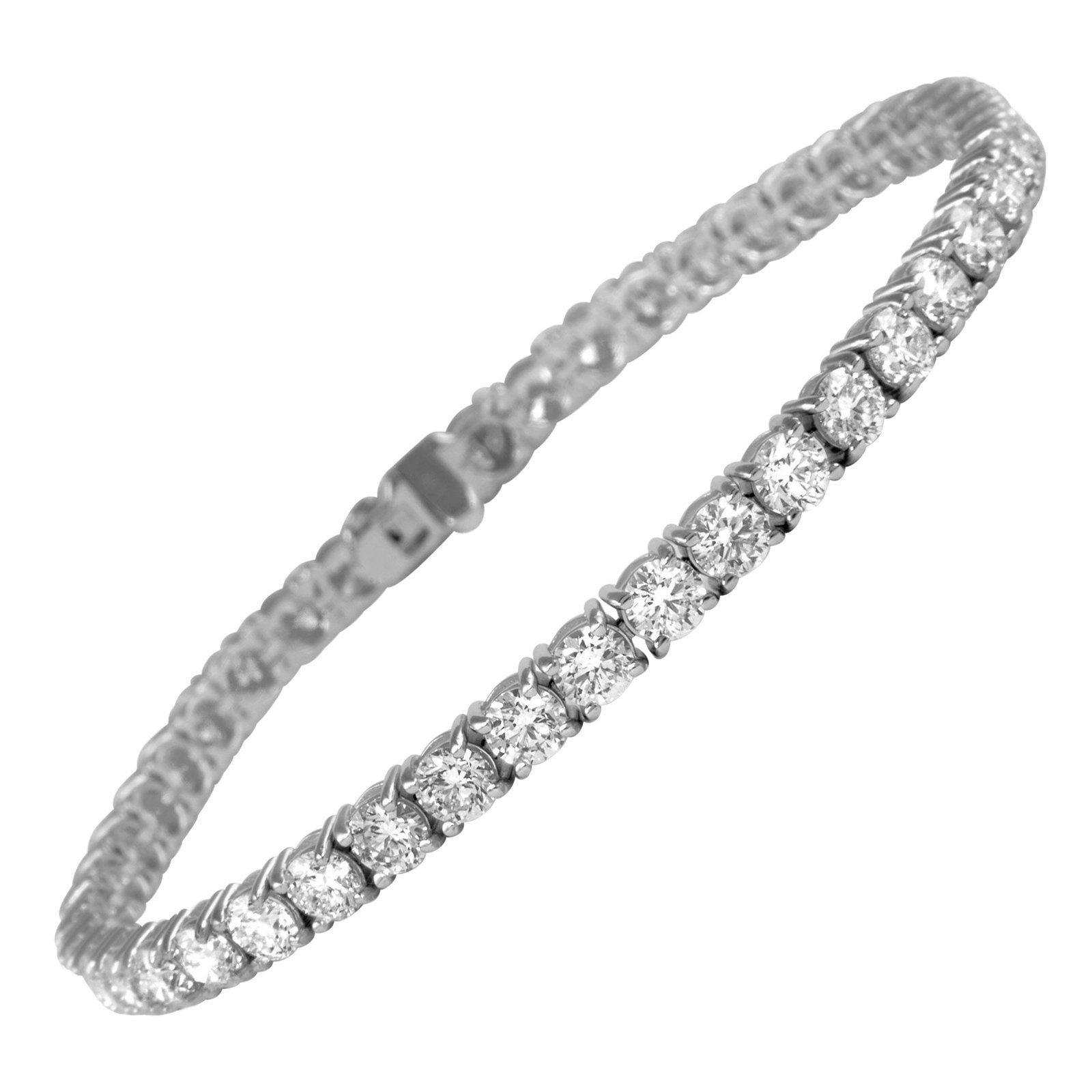 14k White Gold Diamond Tennis Bracelet 8.56ct 7 In: 14k White Gold Diamond Tennis Bracelet 8.56ct 7 In Contemporary diamond tennis bracelet set with 45 round brilliant diamonds totaling 8.56 ct. The diamonds are approximately D-F color and VS1/VS2 clar