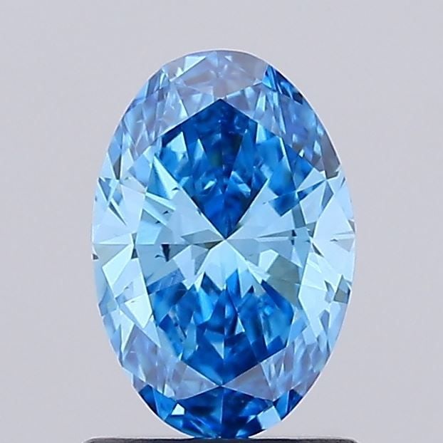 Loose Diamond - OVAL 1.04ct Fancy Vivid Blue VS2: Loose Diamond - OVAL 1.04ct Fancy Vivid Blue VS2 Source: This is a real non-mined Diamond that has been grown in a lab Shape: OVAL Carats: 1.04 Color: Fancy Vivid Blue Certification: IGI Video: