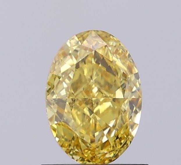 Loose Diamond - OVAL 1.07ct Fancy Vivid Yellow VVS2: Loose Diamond - OVAL 1.07ct Fancy Vivid Yellow VVS2 Source: This is a real non-mined Diamond that has been grown in a lab Shape: OVAL Carats: 1.07 Color: Fancy Vivid Yellow Certification: IGI Video: