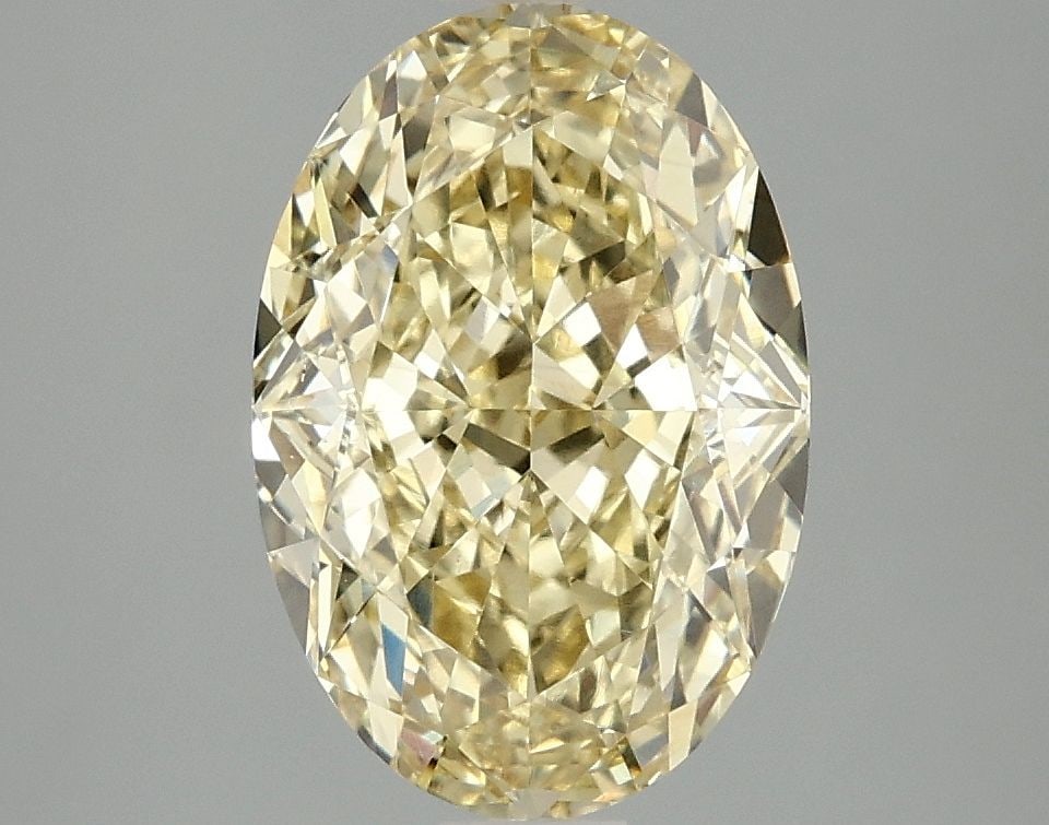 Loose Diamond - OVAL 3.09ct Fancy Intense Yellow VS1: Loose Diamond - OVAL 3.09ct Fancy Intense Yellow VS1 Source: This is a real non-mined Diamond that has been grown in a lab Shape: OVAL Carats: 3.09 Color: Fancy Intense Yellow Certification: IGI Video