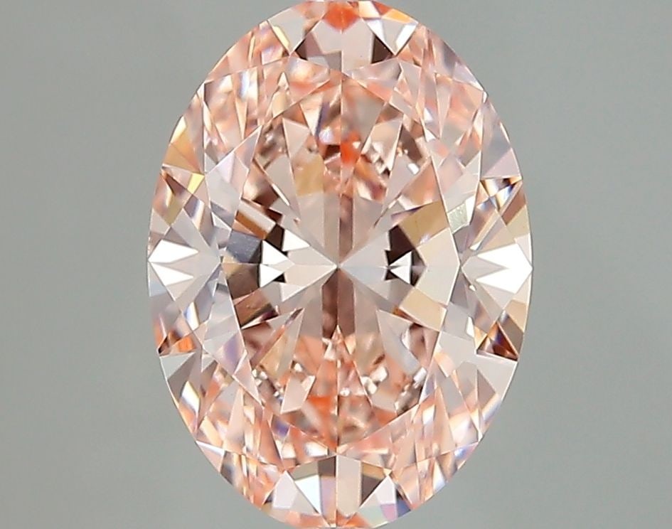 Loose Diamond - OVAL 2.5ct Fancy Light Orange Pink VVS2: Loose Diamond - OVAL 2.5ct Fancy Light Orange Pink VVS2 Source: This is a real non-mined Diamond that has been grown in a lab Shape: OVAL Carats: 2.5 Color: Fancy Light Orange Pink Certification: IGI 