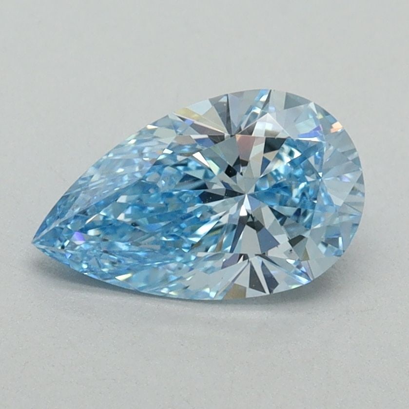 Loose Diamond - PEAR 1.03ct Fancy Vivid Blue VS1: Loose Diamond - PEAR 1.03ct Fancy Vivid Blue VS1 Source: This is a real non-mined Diamond that has been grown in a lab Shape: PEAR Carats: 1.03 Color: Fancy Vivid Blue Certification: IGI Video:
