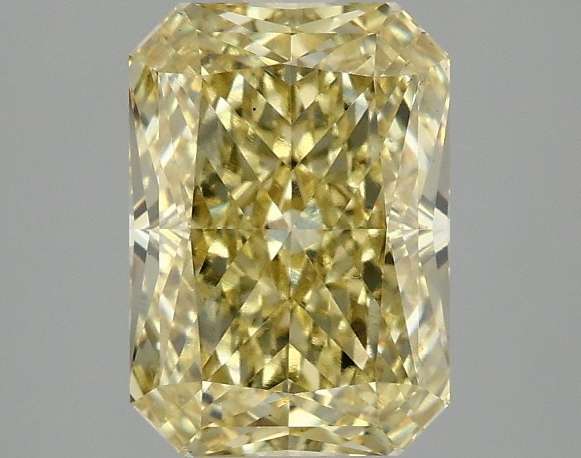Loose Diamond - RADIANT 3.08ct Fancy Vivid Yellow VS1: Loose Diamond - RADIANT 3.08ct Fancy Vivid Yellow VS1 Source: This is a real non-mined Diamond that has been grown in a lab Shape: RADIANT Carats: 3.08 Color: Fancy Vivid Yellow Certification: IGI Vid