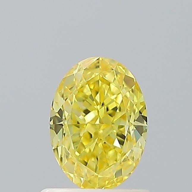 Loose Diamond - OVAL 1.04ct Fancy Vivid Yellow VVS2: Loose Diamond - OVAL 1.04ct Fancy Vivid Yellow VVS2 Source: This is a real non-mined Diamond that has been grown in a lab Shape: OVAL Carats: 1.04 Color: Fancy Vivid Yellow Certification: IGI Video: