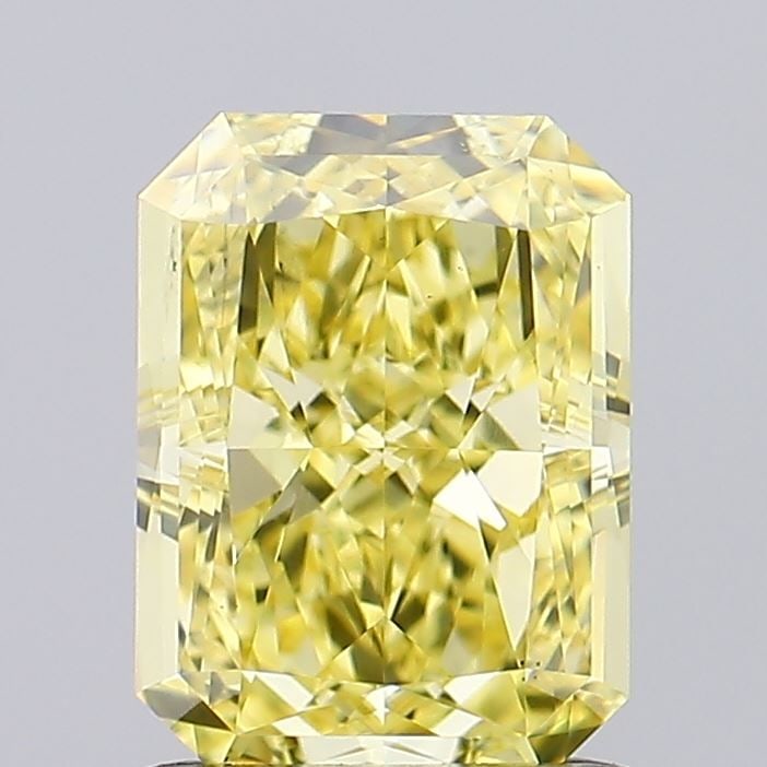 Loose Diamond - RADIANT 1.24ct Fancy Vivid Yellow VS2: Loose Diamond - RADIANT 1.24ct Fancy Vivid Yellow VS2 Source: This is a real non-mined Diamond that has been grown in a lab Shape: RADIANT Carats: 1.24 Color: Fancy Vivid Yellow Certification: IGI Vid